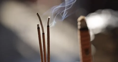 The Zen-like atmosphere of incense in the temple Stock Footage 329874184