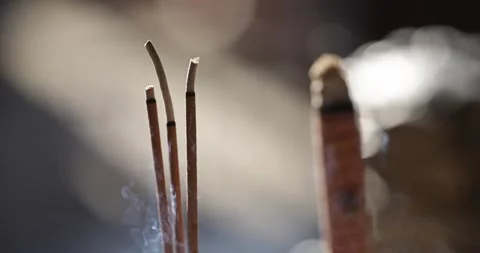 The Zen-like atmosphere of incense in the temple Stock Footage 329874185