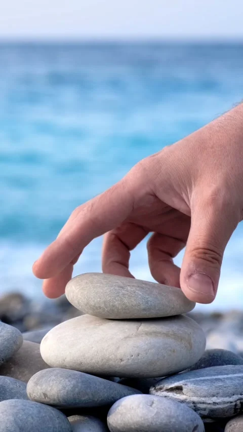 Zen balanced stones stack Video stock 267880426