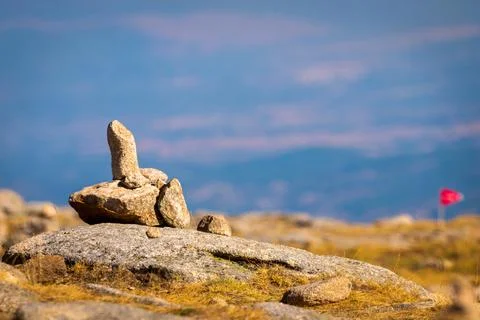 Zen balanced stones stack in high mountains. Scenic mountain view. Stock Photos