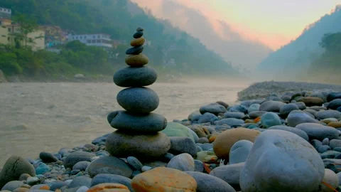 The Zen of Balancing stones in side of ganges river uttarakhand Stock Footage 279801533
