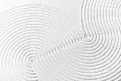 Zen garden sand texture with concentric circles and wavy lines, abstract patt Stock Photos