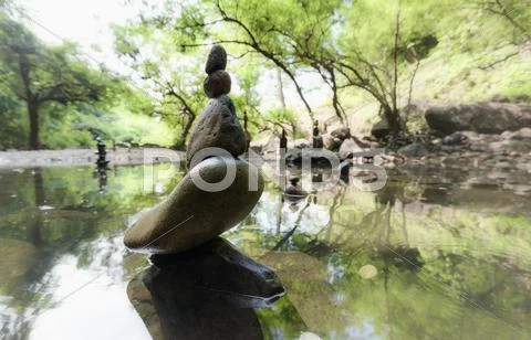 Zen meditation landscape. Calm and spiritual nature environment with stones p Stock Photos