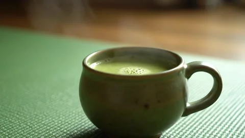 Zen Moment: Steaming Matcha in Rustic Ceramic Stock-Footage 339272015