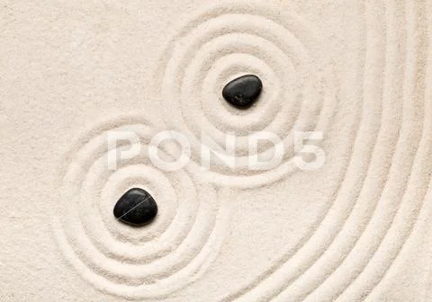 Zen sand and stone garden with raked lines, curves and circles. Simplicity, c Stock Photos