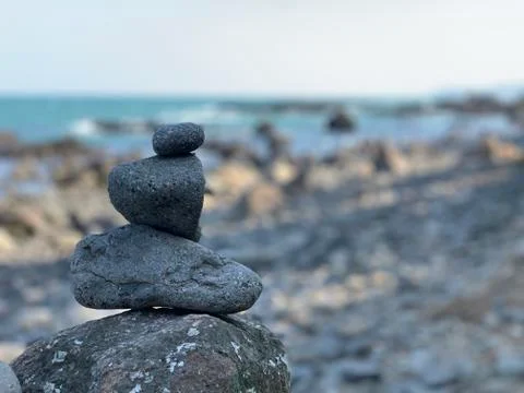 Zen stack of pebbles on the beach Stock Photos