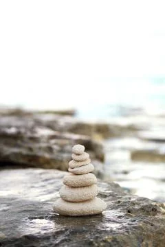 Zen stones, background ocean for the perfect meditation Stock Photos
