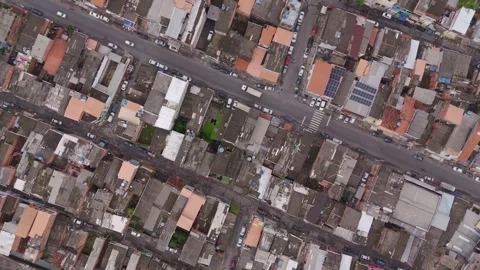 Zenith drone perspective of dense residential rooftops and narrow streets in a Stockbeeldmateriaal 333374972