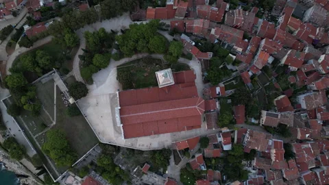Zenithal View Orbit Over Rovinj Church in 4K Stock Footage 258371224