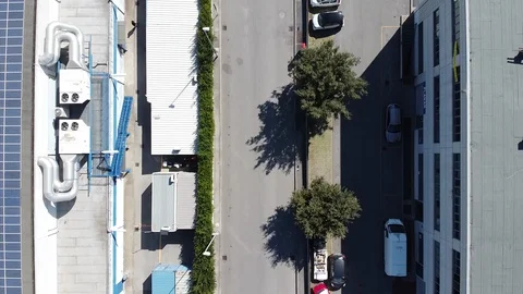 Zenithal view of a road between two warehouses, Rome Stock Footage 126382404