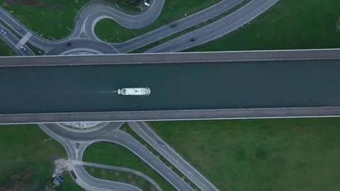 Zenithal zoom in over boat navigating elevated canal in Strépy-Thieu Stock Footage 323157659