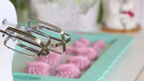 Zephyr lies on a tray. It stabilizes after formation. Shot through the whisk  Stock Footage 134450872