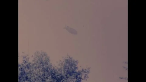 Zeppelin going over head Stock Footage 251832751