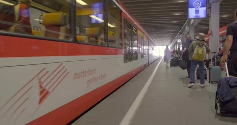 Zermatt to Tasch shuttle train arriving, Railroad Terminal, Switzerland - 4K Stock Footage 254365111
