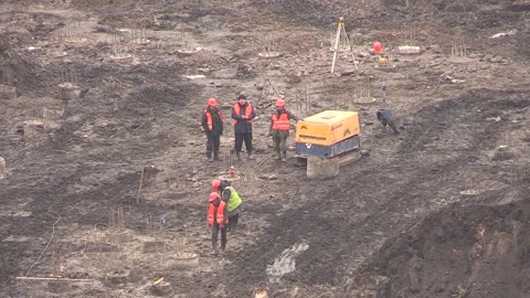 Zero-cycle workers make the foundation - 1 Stock Footage 147436624