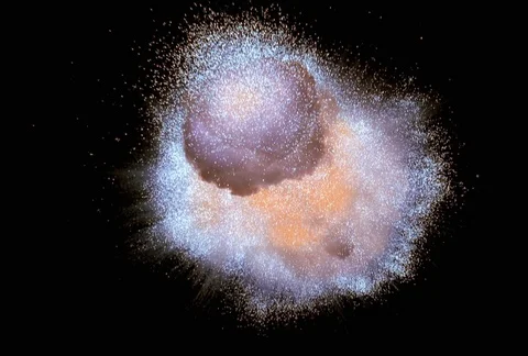 Zero gravity orange and gold starburst exploding twice, with debris 스톡 동영상 86915442