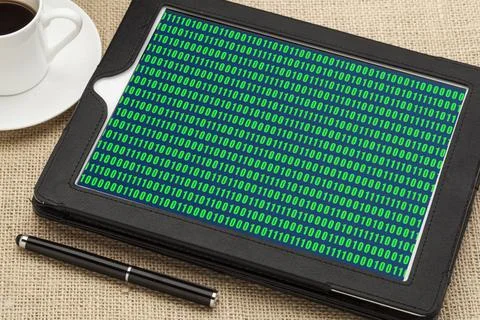  zero one binary data zero one binary data on a screen of a digital tablet... Stock Photos