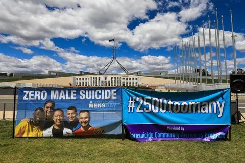 Zero Suicide Awareness Program display featuring boots laid out on the ground Stock Photos