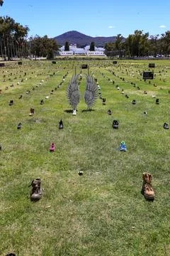Zero Suicide Awareness Program display featuring boots laid out on the ground Stock Photos