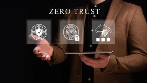 Zero trust security concept, Person using tablet with zero trust icons on vi Stock Photos