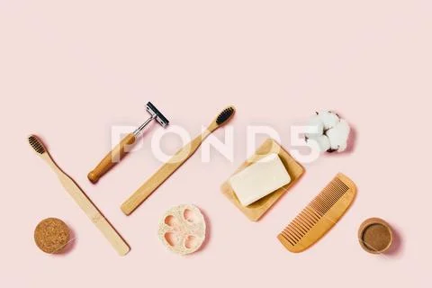 Zero waste accessories on pink background. Stock Photos