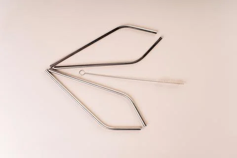 Zero waste and eco friendly,plastic free concept.Metal reusable tubes on white Stock Photos