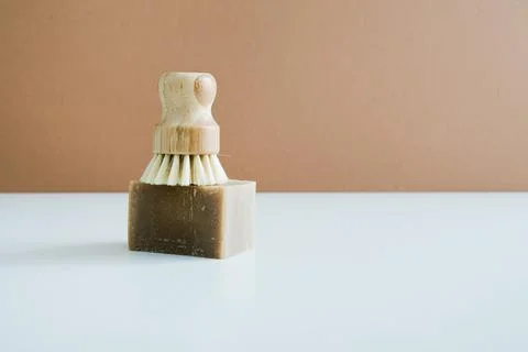 Zero waste bamboo brush with soap for dishwashing Stock Photos