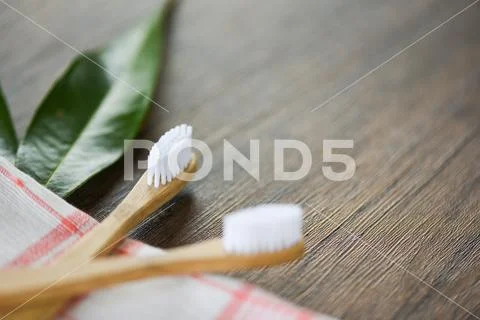 Zero waste Bathroom use less plastic concept / bamboo toothbrush Stock Photos