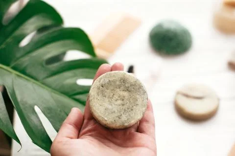 Zero waste. Choice plastic free eco products. Hand holding natural solid sham 스톡 사진