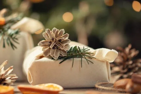 Zero waste christmas concept. Packed in natural fabric gifts and decorations  Stock Photos