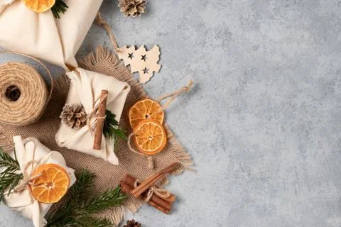 Zero waste christmas concept. Packed in natural fabric gifts and decorations  Stock Photos