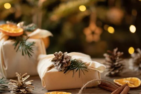 Zero waste christmas concept. Packed in natural fabric gifts and decorations  Stock Photos