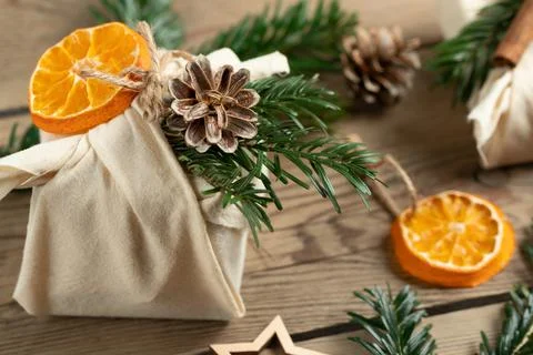 Zero waste christmas concept. Packed in natural fabric gifts and decorations  Stock Photos