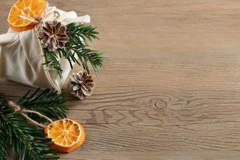 Zero waste christmas concept. Packed in natural fabric gift and decorations f Stock Photos