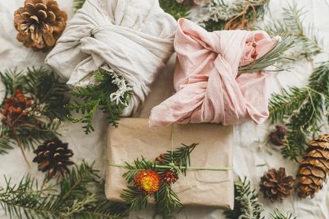 Zero waste Christmas flat lay. Stylish christmas gifts wrapped in fabric an.. Stock Photos