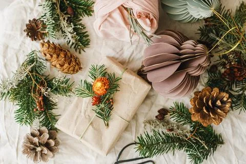 Zero waste Christmas flat lay. Stylish christmas gifts wrapped in fabric an.. Stock Photos
