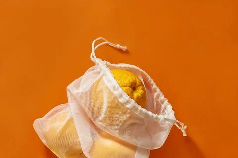 Zero waste concept. Eco bag with oranges. Bag Sewn from an old curtain. plastic Stock Photos