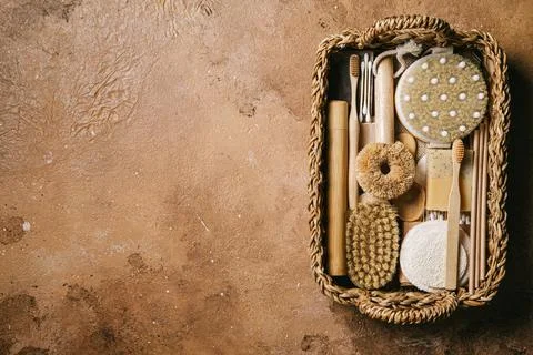 Zero waste concept. Eco friendly bathroom and kitchen accessories in a wicker Stock Photos