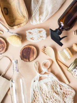 Zero waste concept. Flat lay eco-friendly set. Brushes, bags, bottles and jar Stock Photos