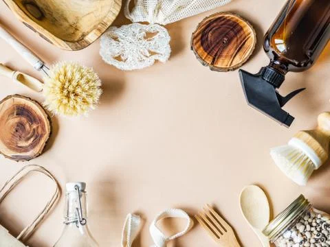 Zero waste concept. Flat lay eco-friendly set. Frame of brushes, bags, bottle Stock Photos