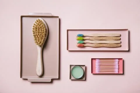 Zero waste concept. Flat lay of eco friendly bathroom accessories in a metal Stock Photos