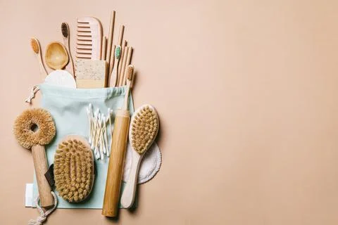 Zero waste. Eco friendly bathroom and kitchen accessories on a beige backgrou Stock Photos