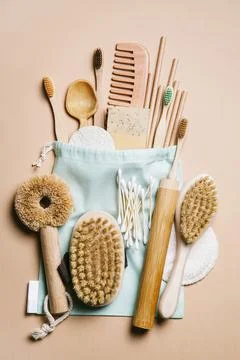 Zero waste. Eco friendly bathroom and kitchen accessories on a beige backgrou Stock Photos
