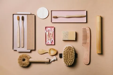 Zero waste. Eco friendly bathroom and kitchen accessories on a beige backgrou Stock Photos