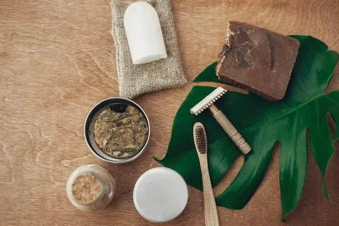 Zero waste flat lay. Natural soap, solid shampoo, metal razor, crystal deodor Stock Photos