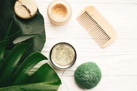 Zero waste flat lay. Natural eco friendly solid shampoo bar, wooden brush,  c Stock Photos
