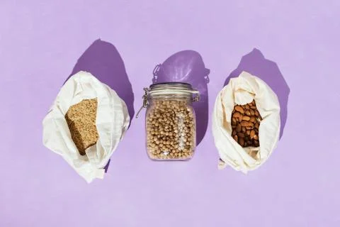 Zero-waste healthy grocery shopping concept: chickpeas, brown rice, almonds i Stock Photos