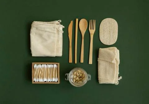 Zero waste kit. Set of eco friendly bamboo cutlery, mesh cotton bags, glass jars Stock Photos