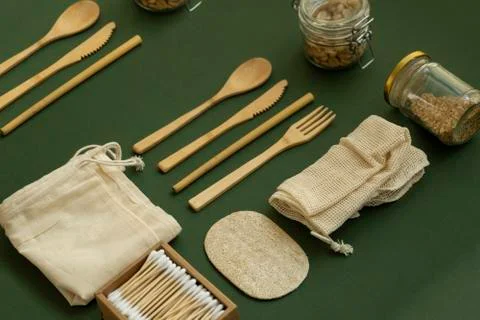 Zero waste kit. Set of eco friendly bamboo cutlery, mesh cotton bags, glass jars Stock Photos