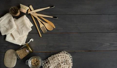 Zero waste kit. Set of eco friendly bamboo cutlery and cleaning brushes, mesh Stock Photos